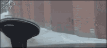 a gif of a car windshield with the website 4gifs.com in the corner