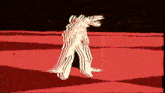 a drawing of a monster standing on a red and black checkered floor