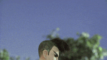 a man is holding a green object on top of his head