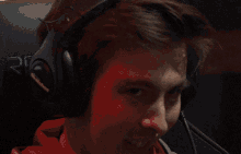 a man wearing headphones and a headband that says pimps