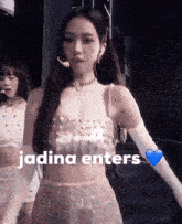 a picture of a woman with the words jadina enters