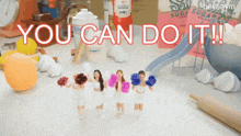 a sign that says " you can do it " with a slide in the background