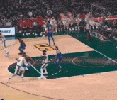 a basketball game is being played on a court with a playstation logo on it