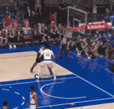 a basketball game is being played on a court with a tyson logo on the court