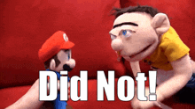 a mario puppet is being held by another mario puppet with the words did not below them