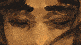 a painting of a woman 's face with tears running down her face