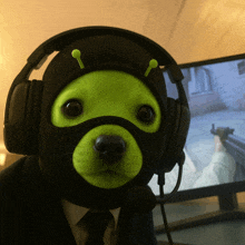 a dog wearing headphones and a mask with green antennas