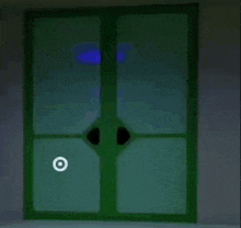 a green object with a white circle around it