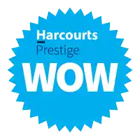 a blue star shaped sticker that says harcourts prestige wow