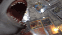 Shark Puppet Pokemon Cards GIF - Shark Puppet Pokemon Cards Pokemon Trading Card Game GIFs