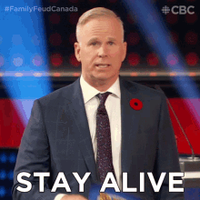 Stay Alive Gerry Dee GIF - Stay Alive Gerry Dee Family Feud Canada GIFs