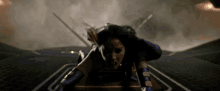 Olivia Munn Psylocke GIF - Olivia Munn Psylocke Jump Out GIFs