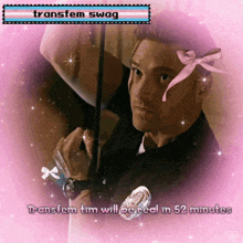 a picture of a man with a pink bow and the words transform tim will be real in 52 minutes on the bottom