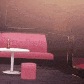 a pink couch with a coca cola bottle on it