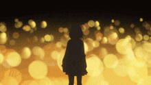 a silhouette of a girl standing in front of a blurred background of lights