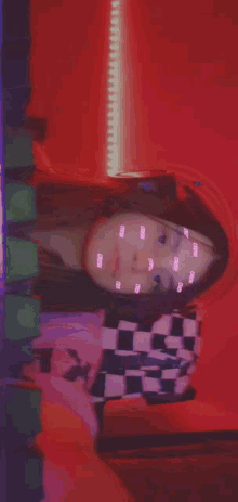 a girl wearing a hat and a checkered shirt has crush written on her face