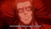 a man with blood on his face is saying these guys are just humans yet they 're coming to kill me