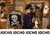 a group of people dressed as pirates are standing around a drum with a skull and crossbones on it .