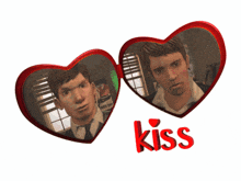 two red hearts with a picture of two men and the word kiss