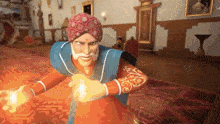 a man in a turban is holding a fireball