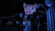 a man in a pig mask is holding a drill and a dollar bill