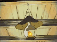 a cartoon drawing of a lantern with a flame coming out of it hanging from the ceiling .