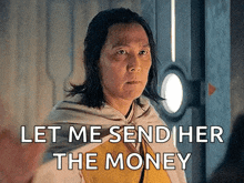 a woman is standing in front of a door with the words `` let me send her the money '' written on it .