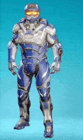 a man in a blue and white armor with a helmet and goggles