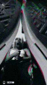 a black and white image of a person yawning with a bbc logo in the lower right corner