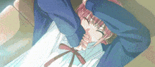 a girl with pink hair and a blue jacket is laying down