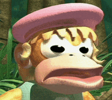 a cartoon monkey wearing a pink hat is making a surprised face