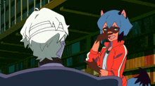 a man with a bandage on his head is talking to a woman with blue hair and ears