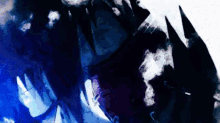 a close up of a person 's face with a purple and blue background