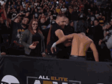 jon moxley darby allin dive punch crowd