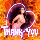 a woman in a pink dress stands in front of a heart with the words thank you written on it
