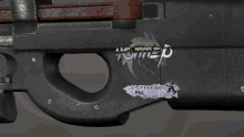 a gun with a sticker that says antwerp pgl 2022