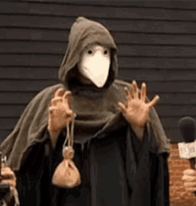 Spooky Mask Face GIF - Spooky Mask Face Fingers GIFs