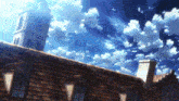 a building with a blue sky and white clouds in the background