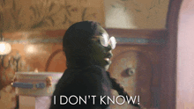 a woman wearing glasses says " i don 't know "