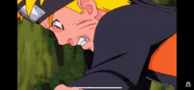a close up of a cartoon character with his mouth open and a sword in his hand .