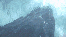 a close up of a mountain covered in ice and snow