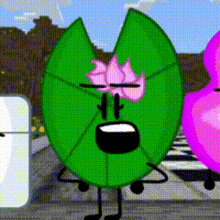 a green leaf with a pink flower on it 's face