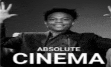 a poster for absolute cinema shows a man in a suit