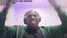 a man wearing headphones with the words play conn on the top