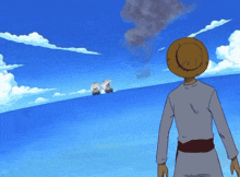a cartoon character standing next to a large cannon