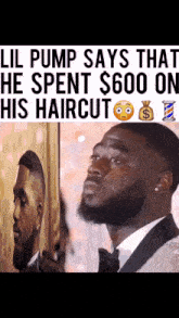 a man in a suit is crying while looking at a picture of himself