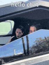 a picture of a man and woman in a car with the words hello chat on the bottom