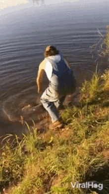 catch viralhog man dives on fish that snaps line river fishing