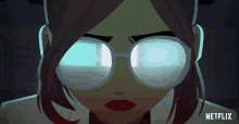 a close up of a woman wearing glasses with netflix written on the bottom