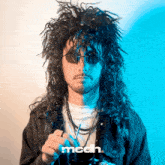 a man in a wig and sunglasses is holding a straw and the word medh is on the bottom left